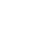 Dental professional in white coat examining patient's teeth in modern clinic office setting.