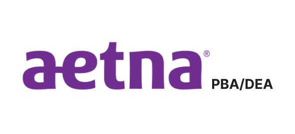Aetna PBA/DEA logo representing dental insurance provider for Breezy Point Smiles.