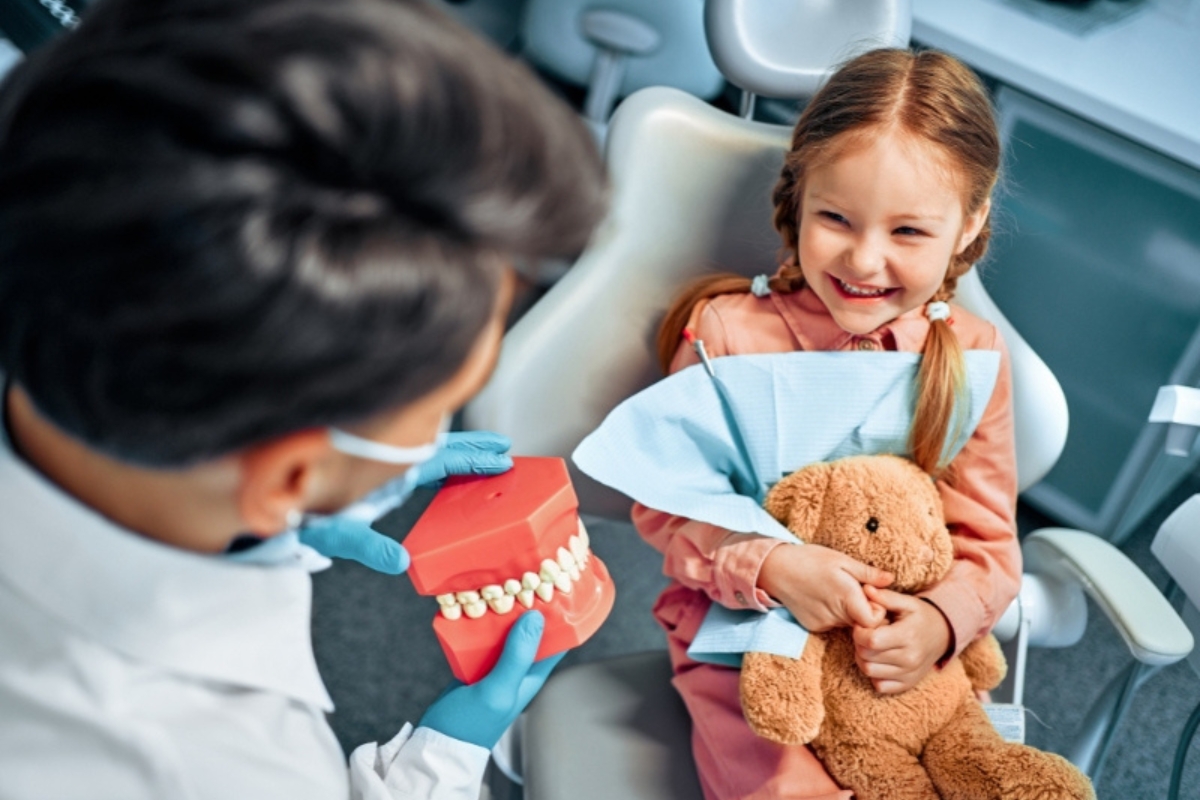 Toddler at a pediatric dental visit to help prevent tooth decay
